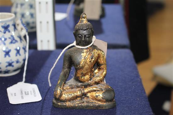 A 17th century Chinese gilded bronze Buddha H.10.5cm